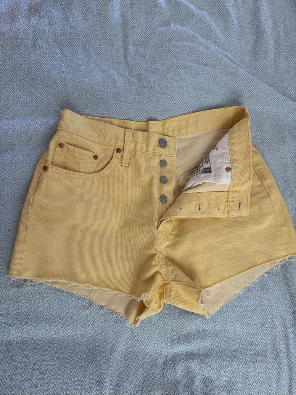 Levi's Yellow Cutoff Denim Shorts with Frayed Hem